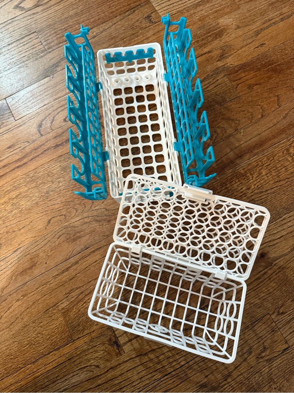 Top rack dishwasher baskets for bottle parts and small items